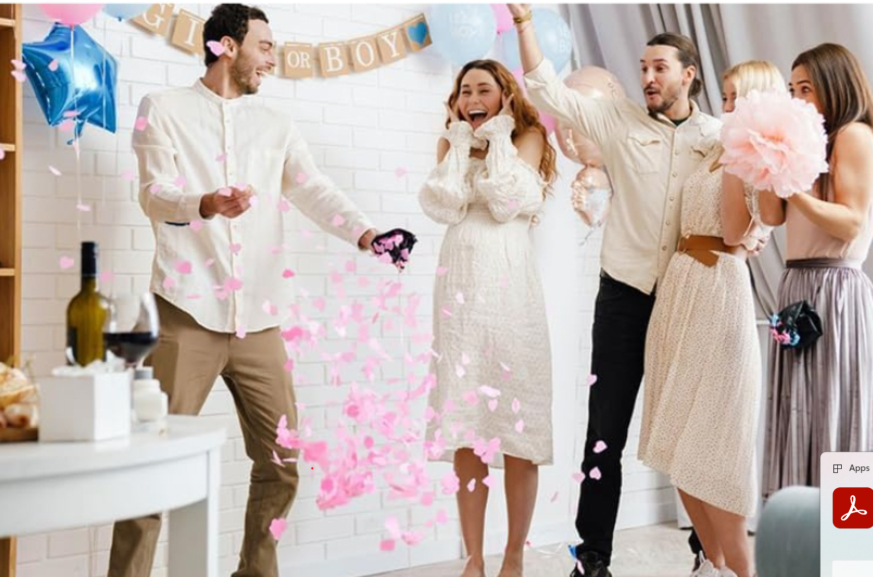 Gender reveal moment — family celebrating the big reveal